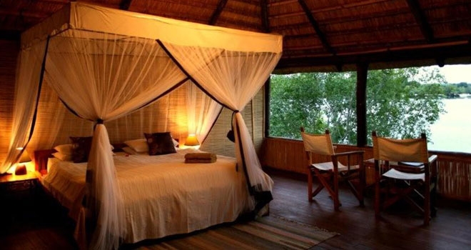 Bedroom at Chundukwa River Lodge canoe safaris luxury accommodation river front