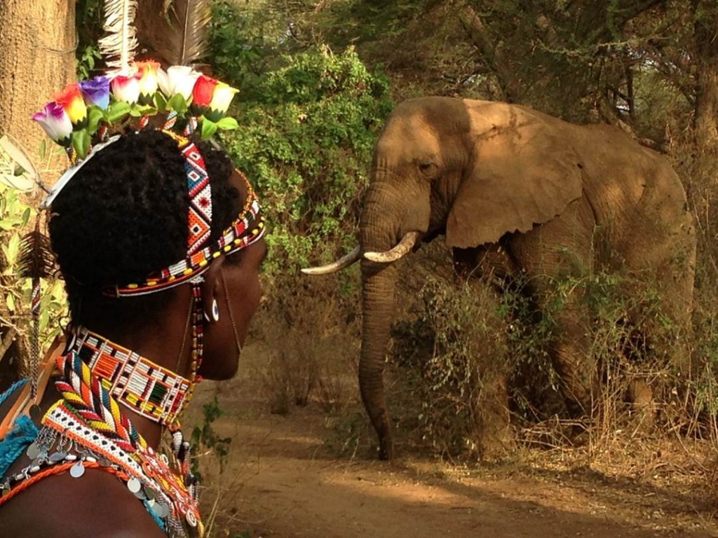 Samburu host at Elephant Watch Camp with elephant