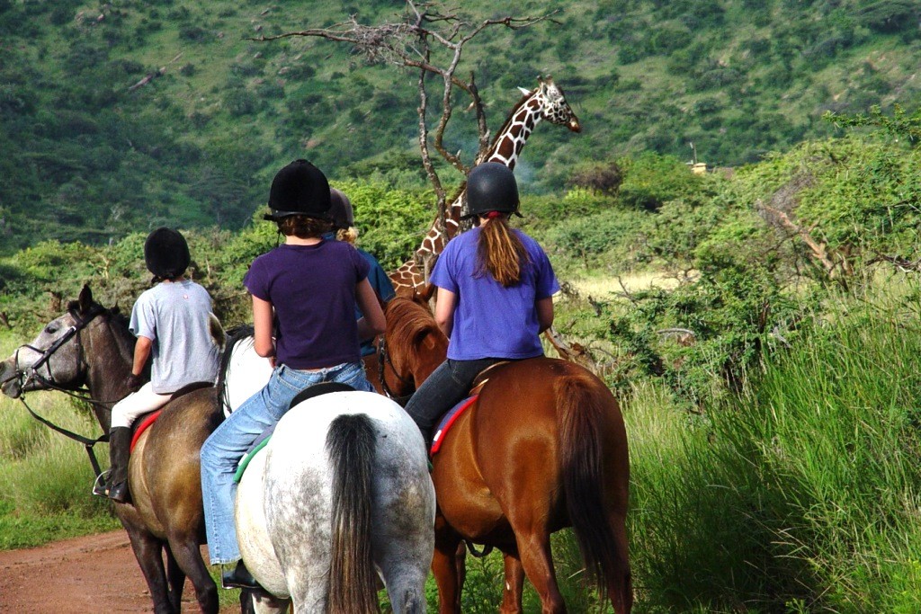 lewa-kenya-children-horseback-giraffe-1024-683-1024x683