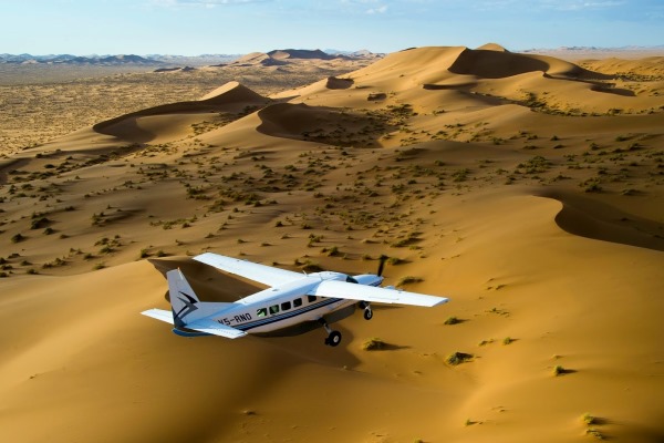 Kulala-Desert-Lodge-Sossusvlei-private-plane-dunes-sky-Namibia-@wildernesssafaris-600-400
