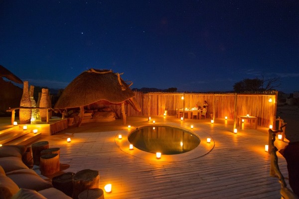 Little_Kulala-Namibia-dining-at-night-stars-5F8A6996L-DanielMyberg-@wildernesssafaris-600-400
