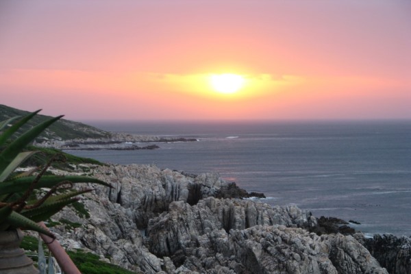 Sunset-deck-Cliff-Lodge-De-Kelders-WalkerBay-sunset-whales-southafrica
