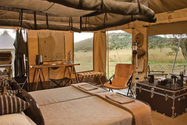 Singita Explore luxury tent bedroom Serengeti Tanzania