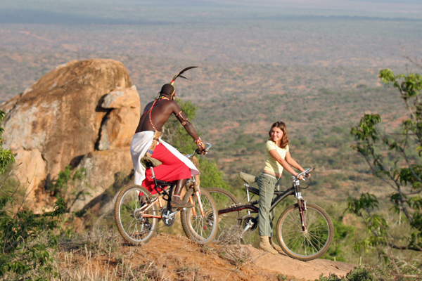 Mountain biking with a guide, Loisaba, Kenya