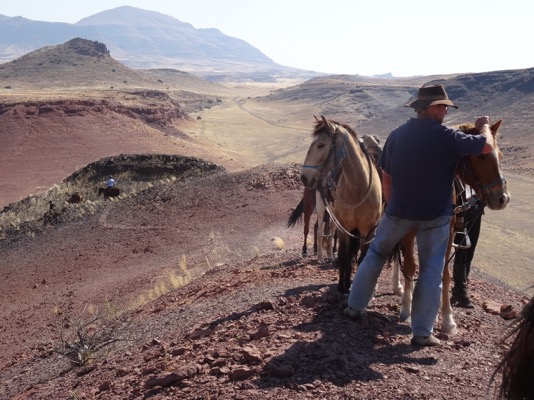 Anneman and guide on hill Namibia Horse Safaris