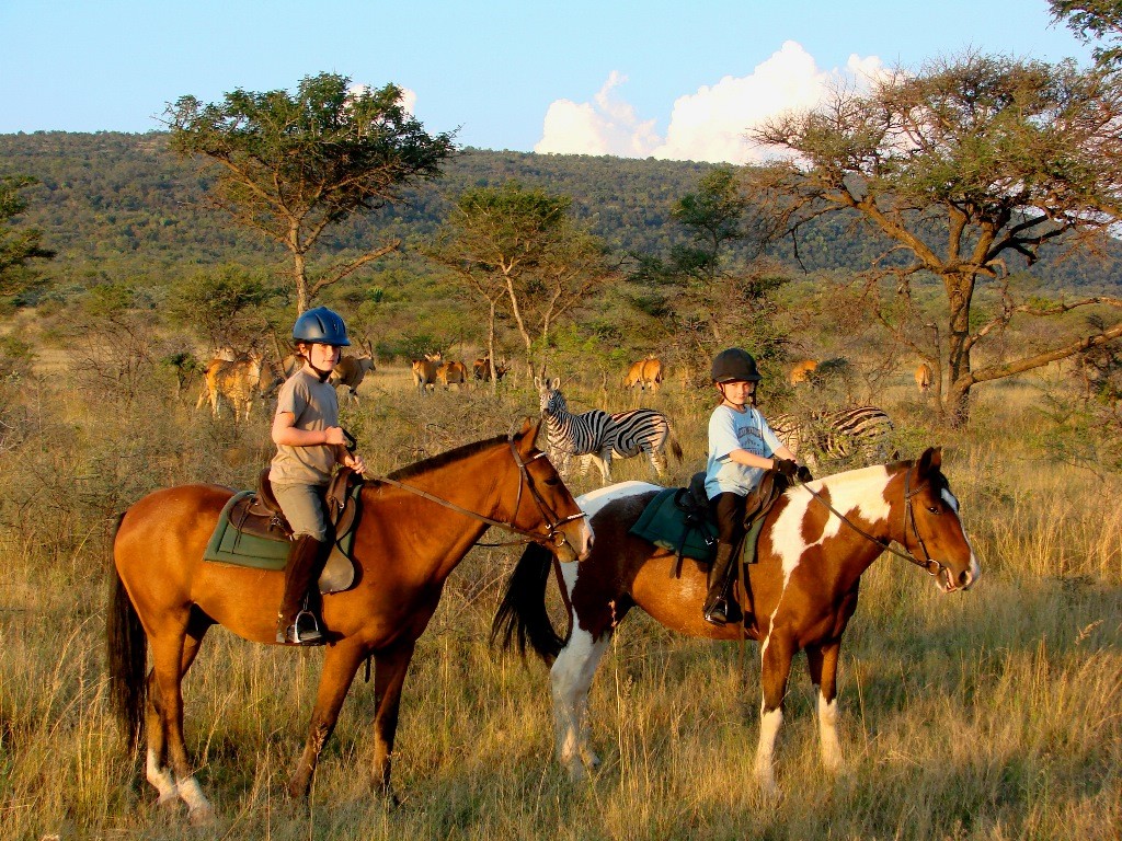 Ants Hill children on horseback, Ants Hill and Ants Nest, Waterberg, South Africa