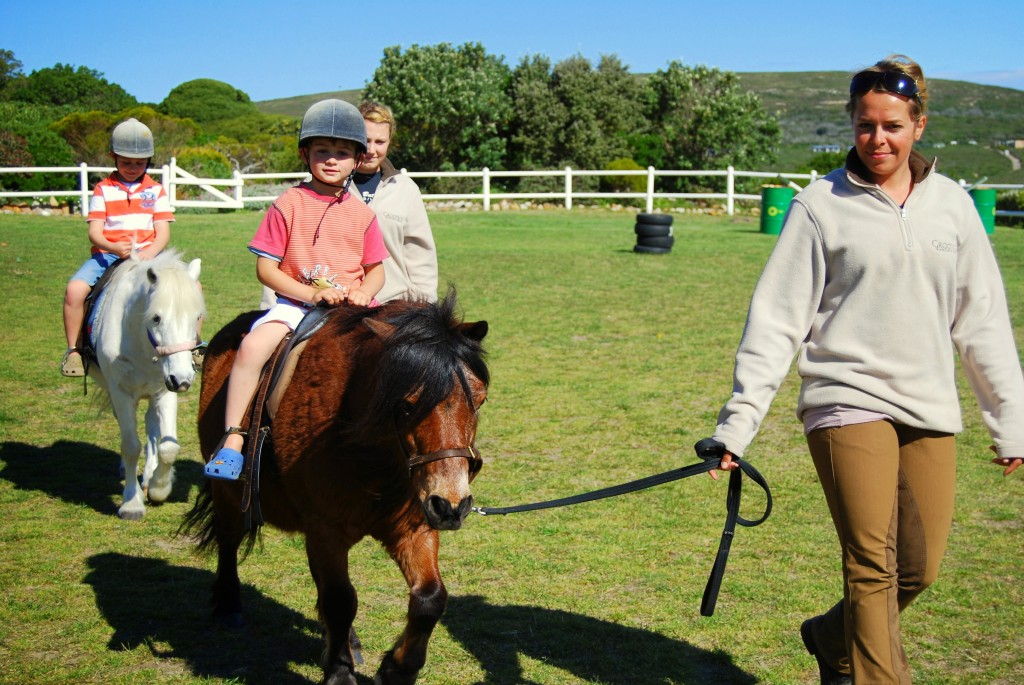 Children at Riding School paddock, Grootbos Riding, Garden Route, South Africa