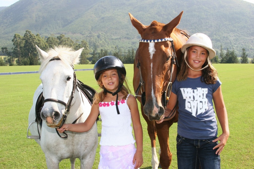 kids enjoying the ponies, Kurland Riding, Garden Route, South Africa