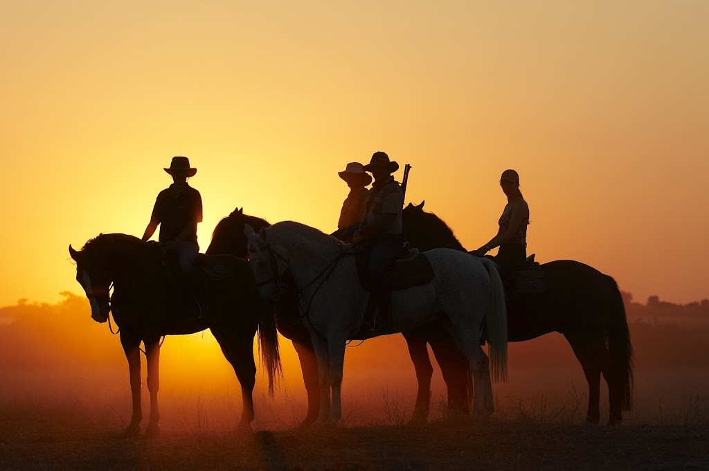 Riders at sunset, Tuli, Botswana