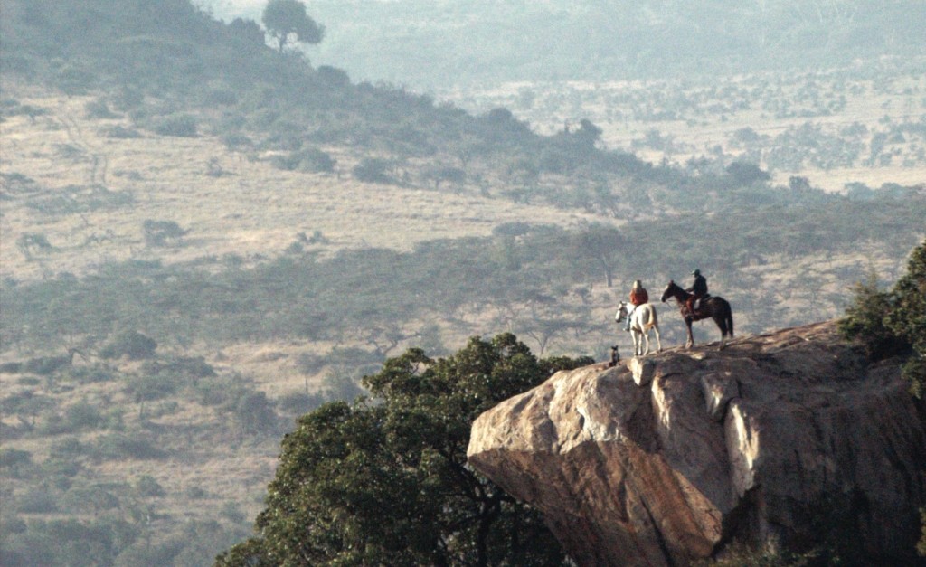 Two riders on an cliff outcrop, Borana Riding Wild, Kenya