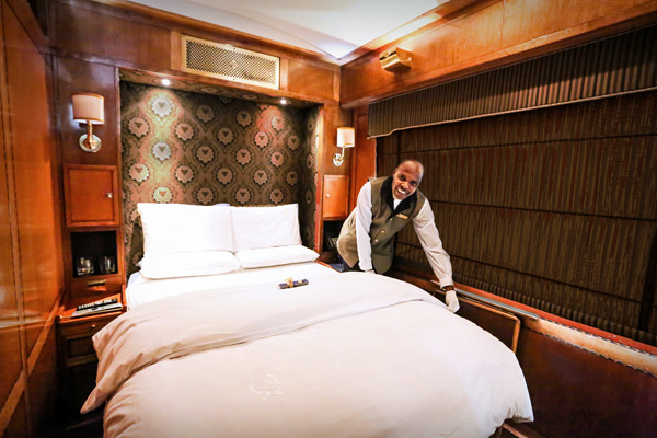 Suites are transformed into luxury bedrooms whilst you dine, Blue Train suite luxury train