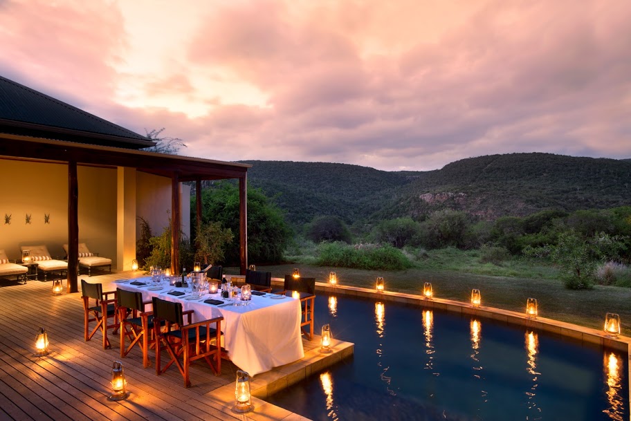 dining and pool night scenen The outback can be refined at Kwandwe Melton Manor, Eastern Cape, South Africa