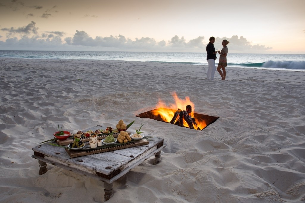 Romantic dinner and drinks on the beach, North Island, Seychelles
