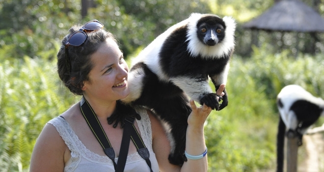 Guest with lemur, Vakona Lodge, Andasibe, Madagascar