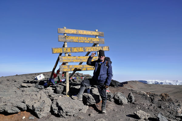 Francis at the top of Mount Kilimanjaro
