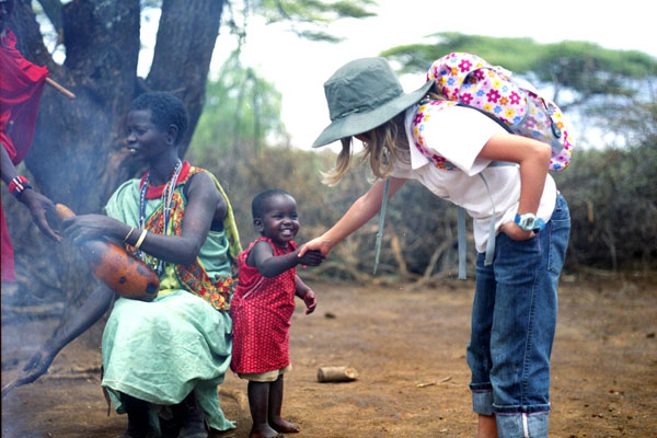 Children shaking hands Kenya by client Mark Walton