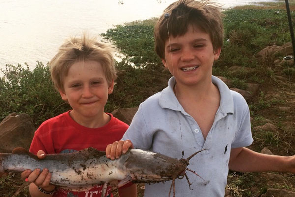 laikipia wilderness fynn and rafe with catfish
