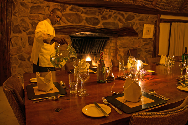 Fireside dining at Borana Lodge Rhino riding safari