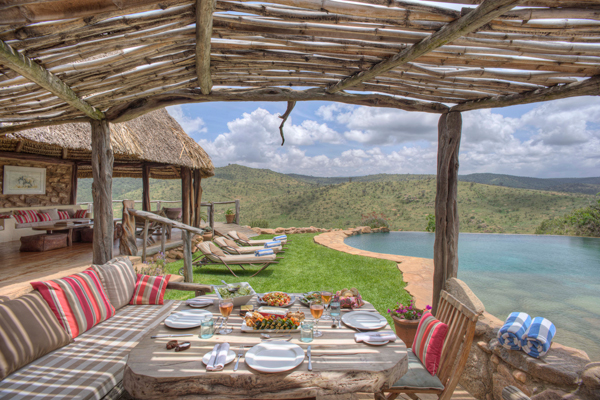 Private lunch dining by the infinity pool at Borana Lodge