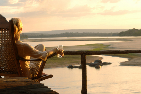 Sundowners with views over the river, Sand Rivers Selous, Selous, Nomad Tanzania