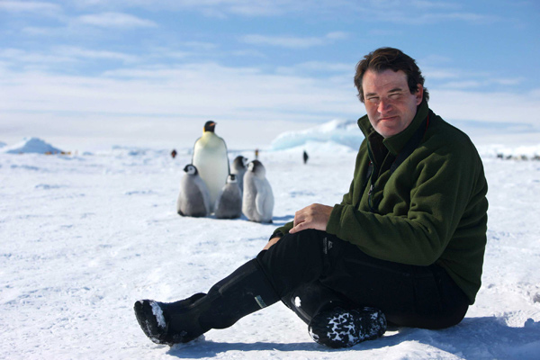 Alastair Fothergill in Antarctica with king penguins - credit Sue Flood