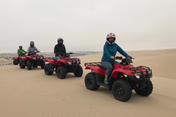 Exploring the dunes on quadbikes Namibia family safari