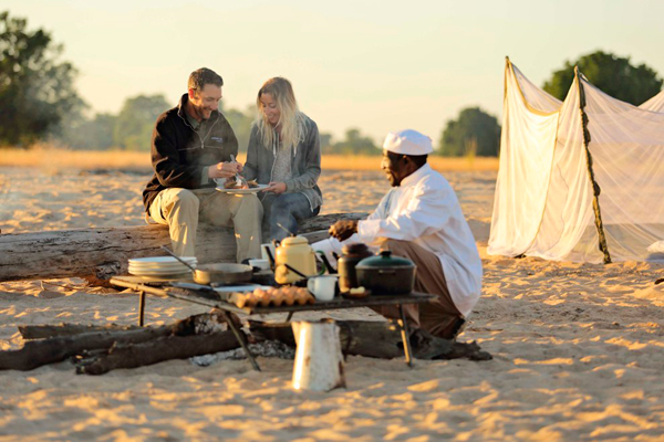 Norman Carr Safaris, camp cooking, in Zambia. Time + Tide Africa