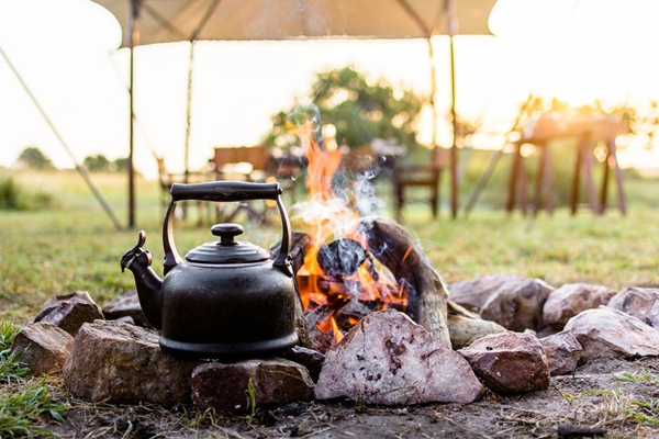 Camp fire morning tea, Singita Explore, Tanzania