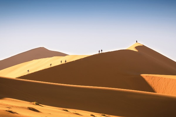 Walking in the Sossusvlei dunes. Sossusvlei Desert Lodge